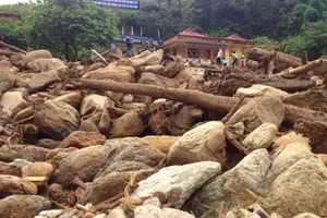 Hiện trường lũ quét sáng 3-8-2017 ở Mù Cang Chải. Ảnh:  NHÃ HUỆ