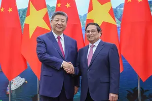 Thủ tướng Phạm Minh Chính và Tổng Bí thư, Chủ tịch nước Trung Quốc Tập Cận Bình, chiều 14-4. Ảnh: VIẾT CHUNG