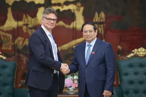 Thủ tướng Phạm Minh Chính tiếp ông Antoine Colin, Phó Chủ tịch cấp cao, phụ trách toàn cầu về chuyển đổi số và chuỗi cung ứng của Tập đoàn HP (Hoa Kỳ), chiều 20-6. Ảnh: VIẾT CHUNG