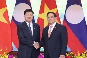 Thủ tướng Phạm Minh Chính hội kiến Tổng Bí thư, Chủ tịch nước Lào Thongloun Sisoulith nhân dịp sang Việt Nam tham dự Lễ mở ký Công ước Liên hợp quốc về chống tội phạm mạng (Công ước Hà Nội), chiều 24-10. Ảnh: QUANG PHÚC