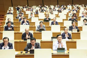 Các đại biểu Quốc hội thông qua Luật Thi hành án dân sự (sửa đổi) với nhiều nội dung mới. Ảnh: QUANG PHÚC