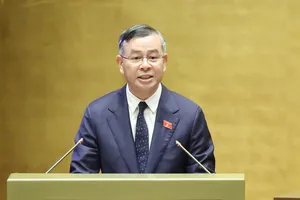Bộ trưởng Bộ Tài chính Ngô Văn Tuấn phát biểu giải trình, làm rõ một số vấn đề đại biểu Quốc hội nêu, sáng 20-8. Ảnh: QUANG PHÚC