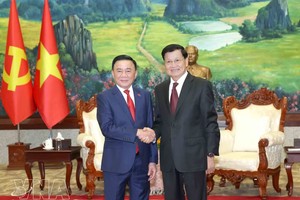 党中央书记处常务书记陈锦秀会见老挝人民革命党中央总书记、国家主席通伦·西苏里。