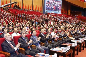 与会代表出席大会。图自越通社 。
