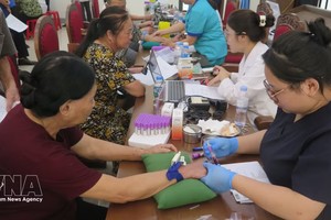 老街省启动针对身份不明烈士亲属的DNA生物样本接收高峰期。图自越通社。