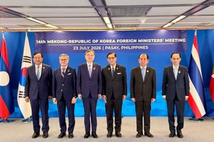 与会代表合影。图自越通社