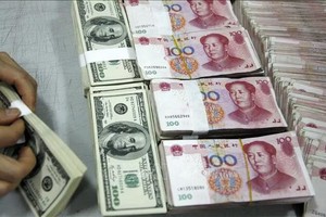 今天（10月1日），美元和人民币汇率齐跌。示意图