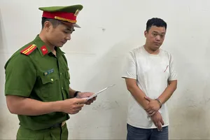 Thái Ngọc Anh tại cơ quan công an. Ảnh: Công an Hà Nội