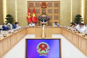 Thủ tướng Phạm Minh Chính chủ trì cuộc làm việc với Ban Nghiên cứu phát triển kinh tế tư nhân. Ảnh: VIẾT CHUNG