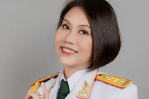 Đại tá, NSƯT Thu Giang, con gái cố nhạc sĩ Ánh Dương. 