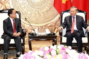 Tổng Bí thư, Chủ tịch nước Tô Lâm tiếp đồng chí Khamphan Phommathat, Phó Thủ tướng, Bộ trưởng Bộ Tư pháp Lào. Ảnh: VIẾT CHUNG