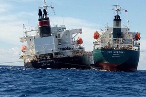 The Caymanian ship and the Panamanian oil tanker (Photo: SGGP)