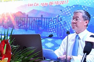 Deputy Minister of Information and Communications Nguyen Thanh Hung speaks at the seminar (Photo: SGGP)