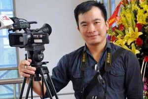 Reporter Dinh Huu Du