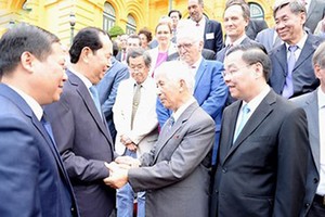 President Tran Dai Quang had an informal meeting with scientists. Photo by VOV.