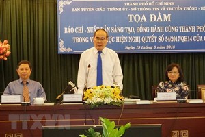 Secretary of the Ho Chi Minh City Party Committee Nguyen Thien Nhan addressed a forum on journalism and publishing held on June 19 (Photo: VNA)