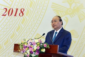 Prime Minister Nguyen Xuan Phuc addresses national teleconference between the Government and localities