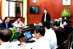 At the yesterday between Agriculture Minister Ngueyn Xuan Cuong and representatives of big livestock corporations (Photo: SGGP)