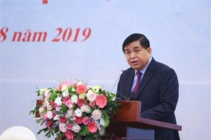 Minister of Planning and Investment Nguyen Chi Dung addresses the conference (Photo: VNA)