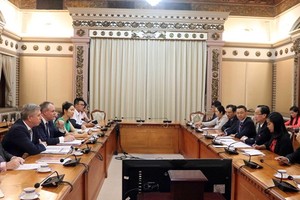 At the meeting ( Photo: VNA)