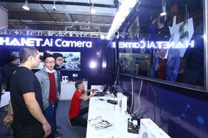 A technology business is displaying its AI camera in Techfest 2019 