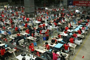 Firms find it significant to improve labour productivity to enhance competitiveness in Industry 4.0 (Photo: VNA)