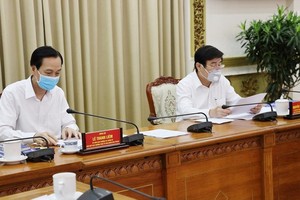Chairman Nguyen Thanh Phong says at the meeting (Photo: SGGP)