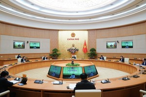 At the teleconference on Covid-19 prevention and control with the central government yesterday afternoon (Photo: SGGP)