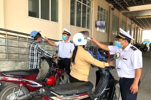 Border guards are measuring people's temperature (Photo: SGGP)