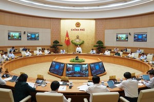 At the meeting ( Photo: VNA)