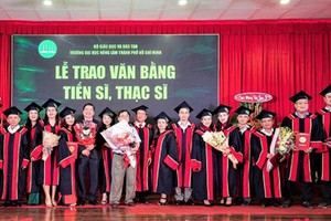 New masters and doctors of HCMC Nong Lam University receiving their degrees on October 31