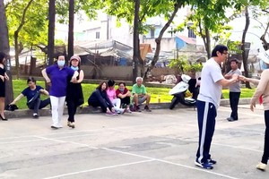 Elder people dance in amusement parks