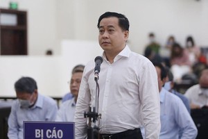 Former intelligence official prosecuted for taking bribe