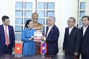Vietnam, Laos seek closer people-to-people exchange