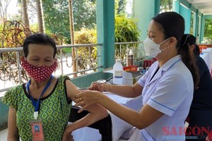 Vietnamese people relaxing their pandemic precautions 