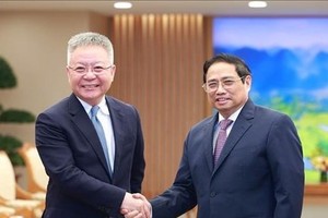 PM suggests stronger cooperation between Vietnamese, Chinese localities
