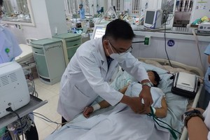 One dead, one in critical condition, nine hospitalized after eating pickled carp