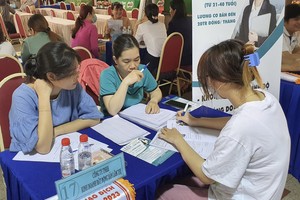 Labor market in HCMC goes from 'massive laying off' to ‘bustling hiring’