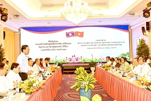 HCMC, Lao’s localities share development experience