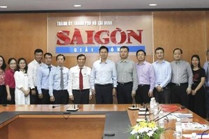 Delegation of Xinhua News Agency visits Saigon Giai Phong Newspaper