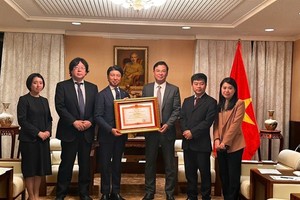 PM's certificate of merit presented to Japan's House of Representatives member