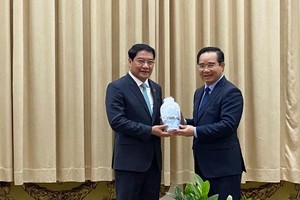 Ho Chi Minh City, Vientiane Capital deepen ties