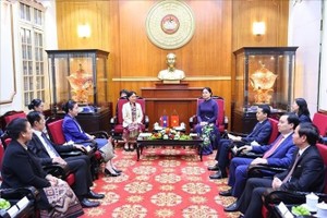 Vietnam, Laos promoting people-to-people exchanges to elevate ties