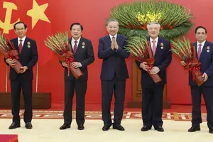 Party chief presents elite honours to incumbent, former leaders