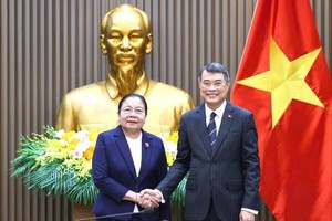 PM receives head of Lao Party's Organisation Commission