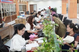 Ho Chi Minh City directs action to secure social and health insurance coverage