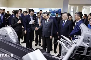 NA President visits Beijing Economic-Technological Development Area