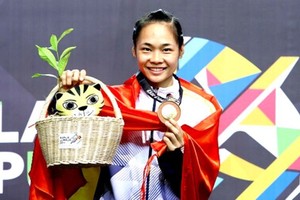 Vietnamese athlete Pham Thi Tuoi wins a gold medal in the women’s Pencak Silat at the 2017 Southeast Asian Games