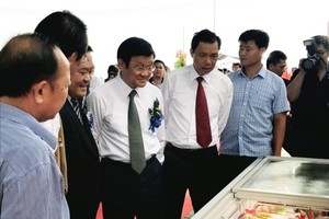 ​ Former President of Vietnam Truong Tan Sang attends in the event.