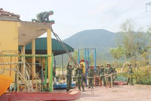 Funtional forces help local people to repair their houses after typhoon Doksuri